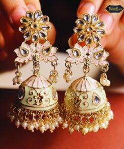 Lotus Bloom Pearl Jhumka Earrings featuring intricate lotus designs with cascading pearls, perfect for traditional and festive occasions.