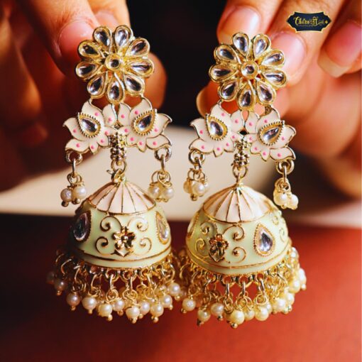 Lotus Bloom Pearl Jhumka Earrings featuring intricate lotus designs with cascading pearls, perfect for traditional and festive occasions.