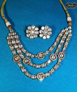 Heritage Glow Multilayered Necklace Set featuring antique gold finish, layered strands, and traditional motifs—ideal for bridal or festive wear.
