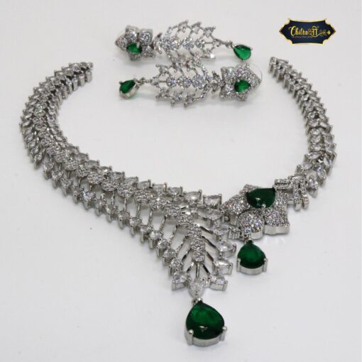 Emerald Bloom Radiance Necklace Set featuring green stones and floral motifs with matching earrings, perfect for festive and elegant occasions.
