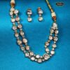 Sitara Glow Necklace – Double-strand Kundan bridal set with gold finish and matching earrings, ideal for wedding ceremonies and traditional bridal wear.
