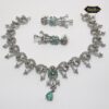 Mint Glow Necklace Set with teardrop charm and delicate floral design in soft green tones, paired with matching earrings