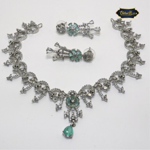 Mint Glow Necklace Set with teardrop charm and delicate floral design in soft green tones, paired with matching earrings