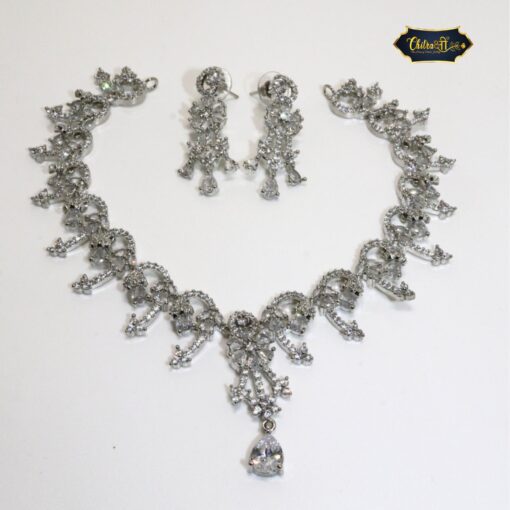 Snowdrop Radiance Necklace Set featuring a delicate floral design and icy teardrop accent with matching earrings
