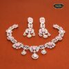 Rose Glow Necklace Set in baby pink and silver tones featuring a delicate necklace and matching earrings for a subtle, elegant look.
