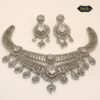 Arctic Sparkle Set featuring icy-toned necklace and earrings with ornate embellishments for a refined, radiant look.