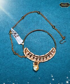 Bold Curved Nath with intricate Kundan stones and a pearl drop, elegant bridal nose ring for traditional Indian weddings.