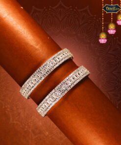 Chandrika Vilas Bangles – Gold-plated traditional Indian bangles with intricate detailing on white background