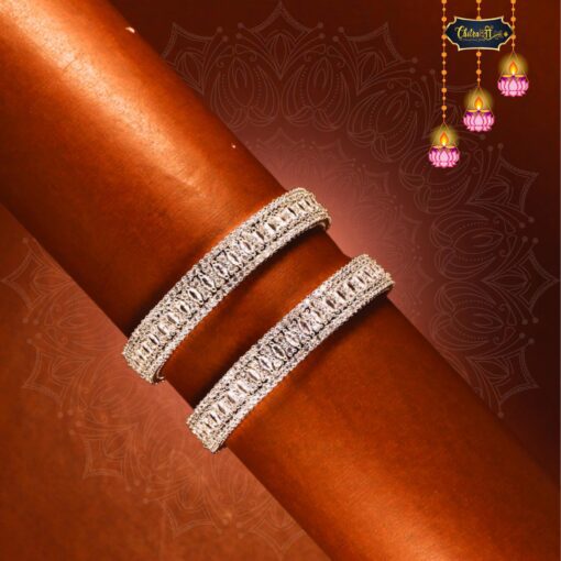 Chandrika Vilas Bangles – Gold-plated traditional Indian bangles with intricate detailing on white background