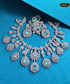 Heavy Bridal Statement Necklace Set with drop stones, matching earrings, and maangtika in a traditional Indian wedding design.