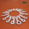 Emerald Bridal Set featuring a green teardrop necklace and matching earrings with a silver finish, ideal for elegant bridal wear.