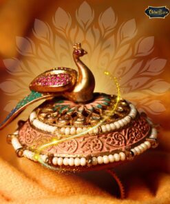 Gold-plated Mayurika Royal Ring with intricate gemstone detailing on white background