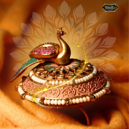 Gold-plated Mayurika Royal Ring with intricate gemstone detailing on white background
