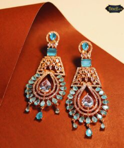 Elegant ocean teardrop statement earrings with aqua blue tones and shimmering dangle design, perfect for adding a graceful touch.