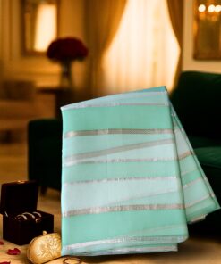 Heritage Banaras Organza Silk Saree in aqua green with silver zari stripes by Chitrankshi, handwoven in Banaras