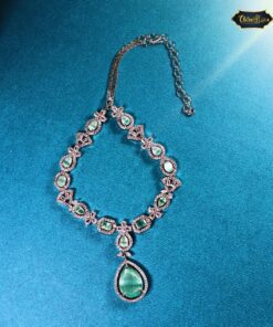 Royal Enchant Choker necklace with elegant stone setting displayed on a black velvet stand against a neutral background.