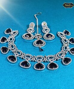 Midnight Royalty Necklace Set featuring heart halo pendant, bridal earrings, and maangtika in a luxurious wedding-ready design.