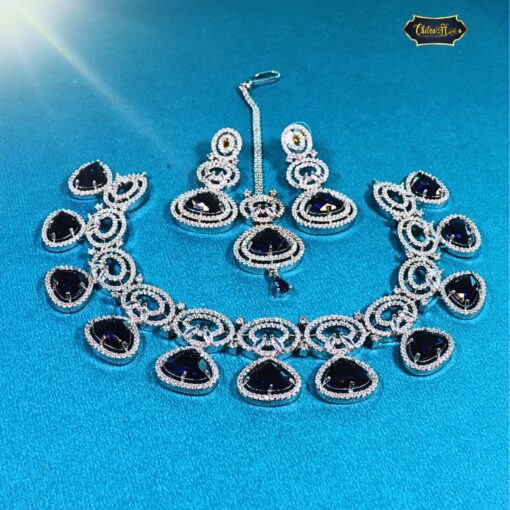 Midnight Royalty Necklace Set featuring heart halo pendant, bridal earrings, and maangtika in a luxurious wedding-ready design.