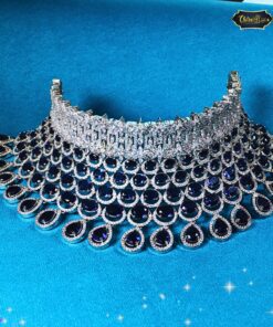 Sapphire collar necklace with pear-shaped drops and coordinated long earrings, designed for luxurious sparkle and bold elegance.
