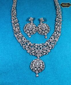 Ethereal Winter Jewelry Set featuring icy necklace and earrings with sparkling white stones, reflecting elegant winter-inspired craftsmanship.