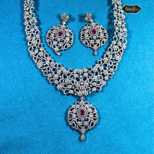 Blushing Elegance Jewelry Set with soft pink stones and diamond details, featuring necklace and earrings in a feminine, graceful design.