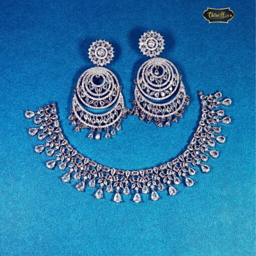 Celestial Cascade Diamond Look Necklace Set featuring cascading teardrop stones and matching earrings, ideal for weddings and elegant formal occasions.