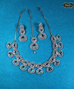 Sky Bloom Necklace Set with floral-inspired design and sky-blue crystal accents, including matching earrings for an elegant and serene event-ready look.