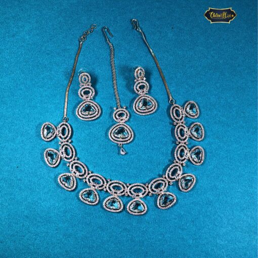 Sky Bloom Necklace Set with floral-inspired design and sky-blue crystal accents, including matching earrings for an elegant and serene event-ready look.