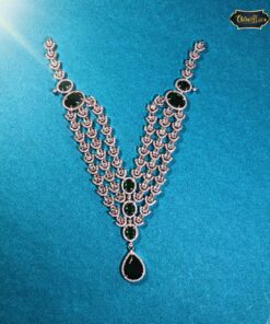 Emerald Cascade Necklace featuring layered green drop stones in a diamond-like weave, complete with matching earrings for a complete elegant look.