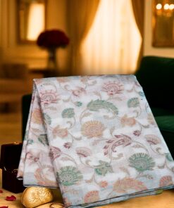 Heritage Banaras Katan Saree in ivory pure silk with handwoven pastel floral motifs, crafted using traditional Banarasi handloom weaving.