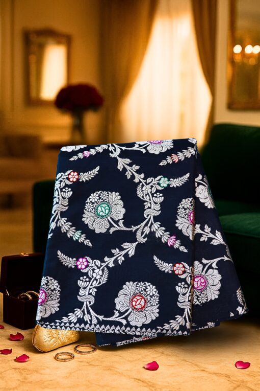 Heritage Banarasi Katan Silk Saree in navy-blue with floral multicolor handwoven motifs by Chitrankshi