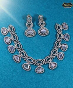 Celestial Dust Bridal Set featuring radiant stones and ethereal detailing, including necklace, earrings, and bracelet for bridal elegance.