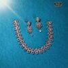 Elegant light-pink gemstone necklace with matching drop earrings in rose-gold plating