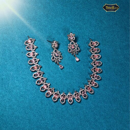 Elegant light-pink gemstone necklace with matching drop earrings in rose-gold plating